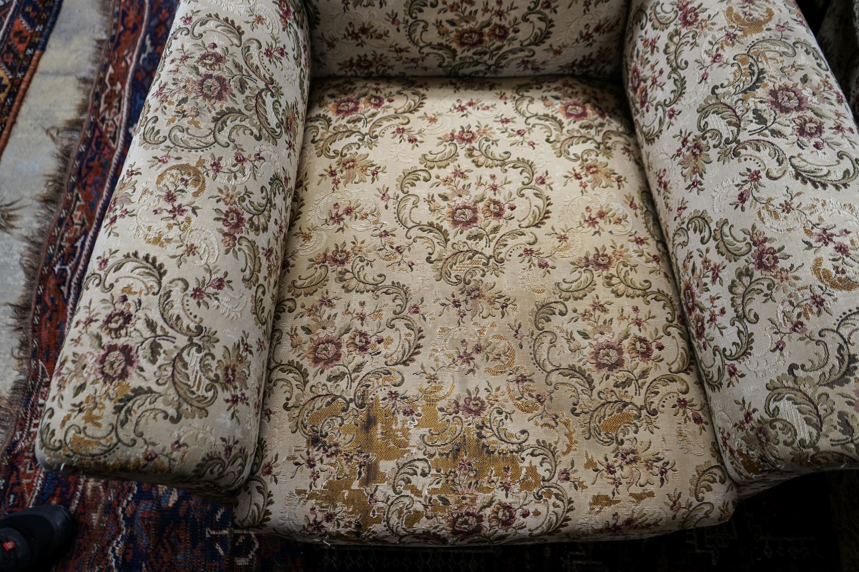 A near pair of late Victorian upholstered armchairs, width 88cm, depth 86cm, height 96cm